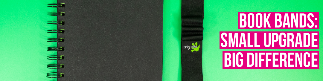 Book Bands: Small Upgrade, Big Difference title on an image of a sketchbook and book band on green background