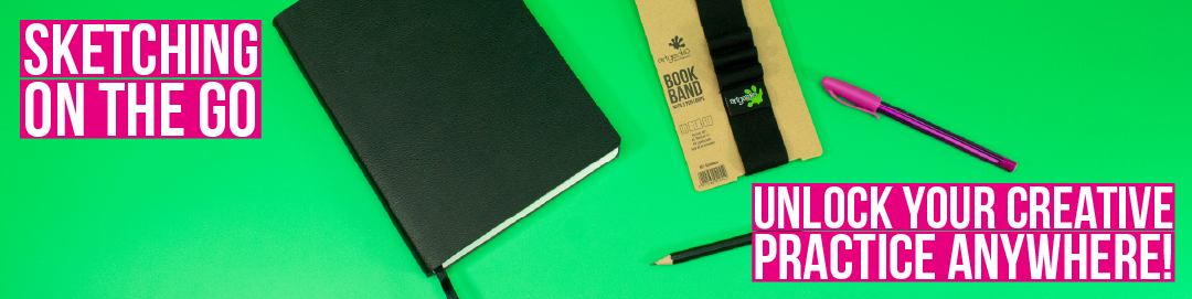 Swanky Gecko Sketchbook on green background with pen, pencil and Book Band