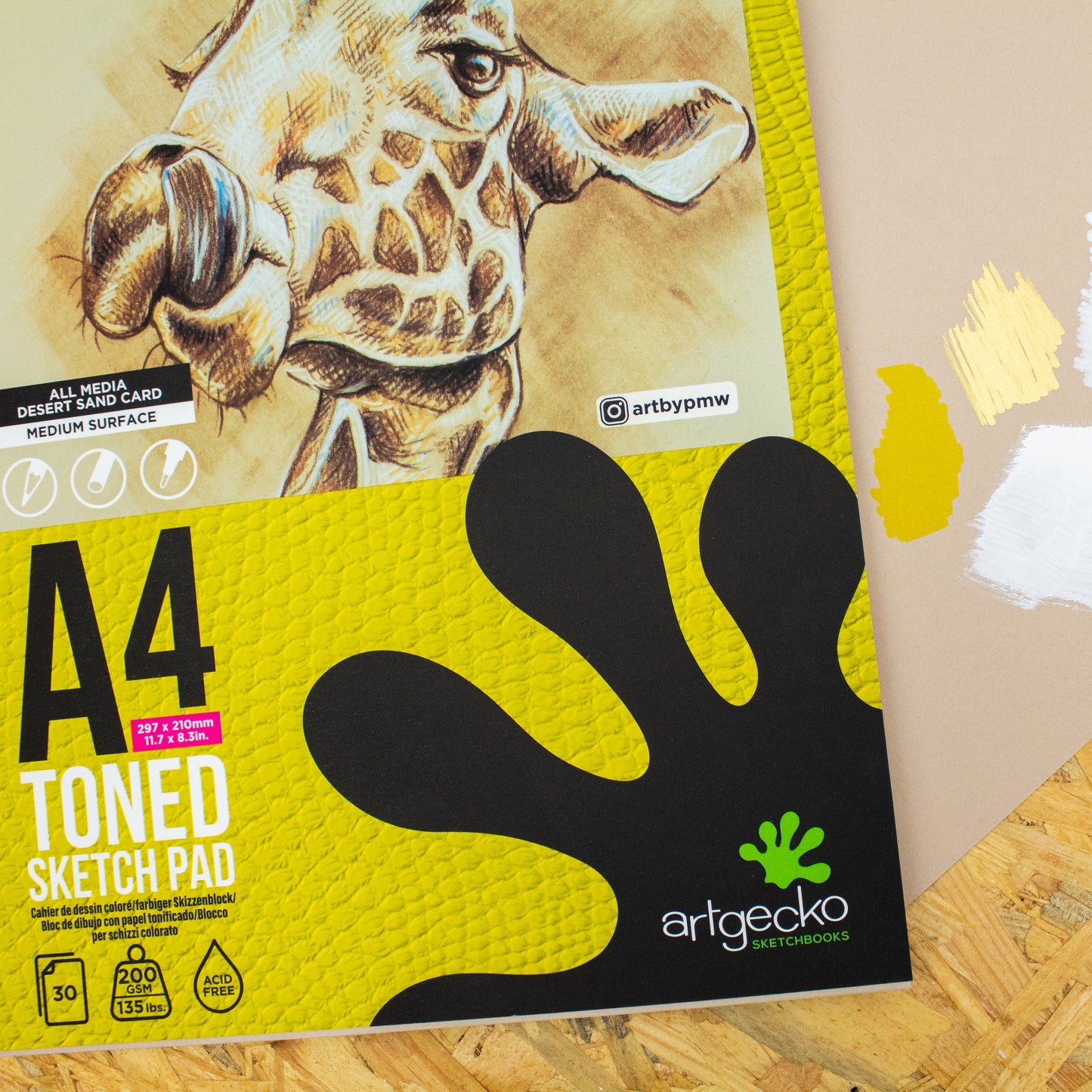 PRO Gecko Toned tan sketch pad with swatch of the paper showing what media it is suitable for.