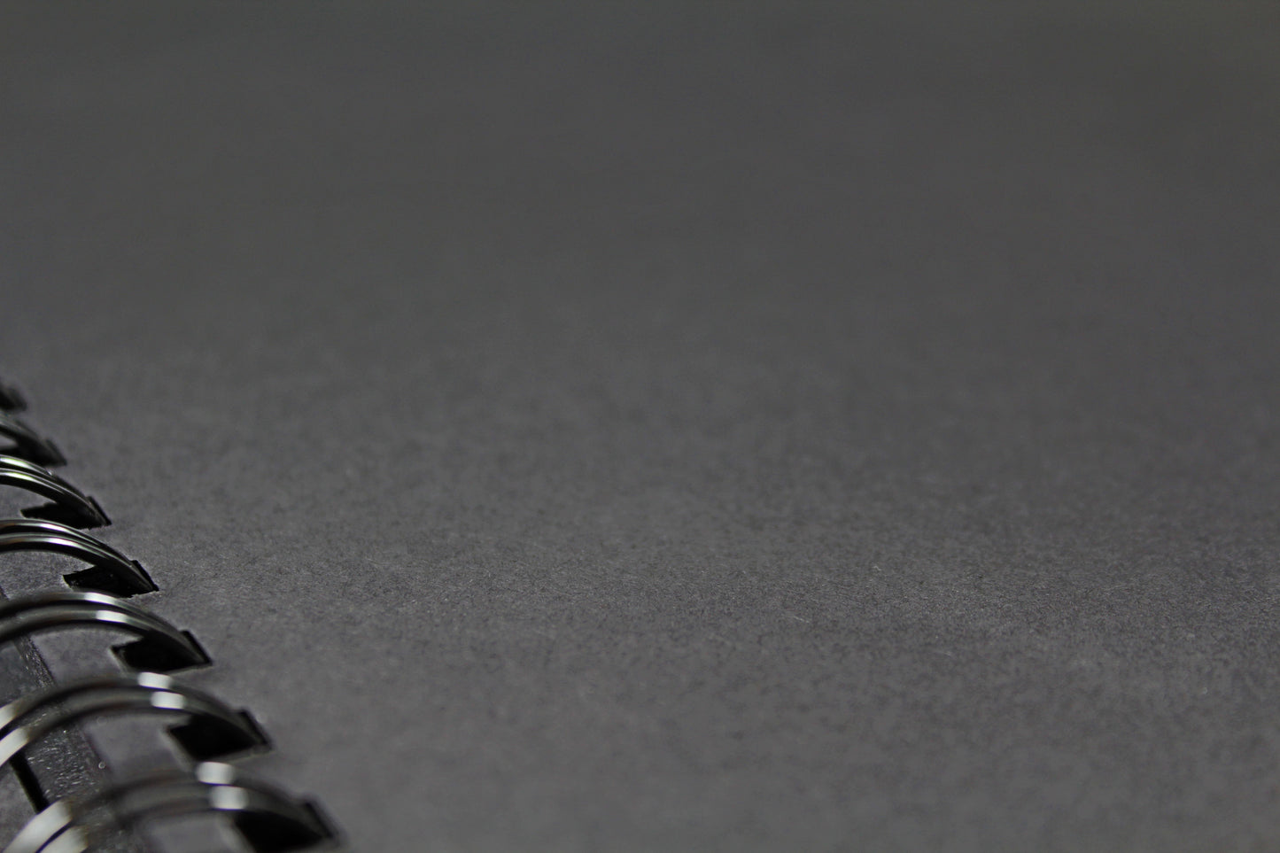 Close up of the jet black card found within an Artgecko 'Stocky' Sketchbook